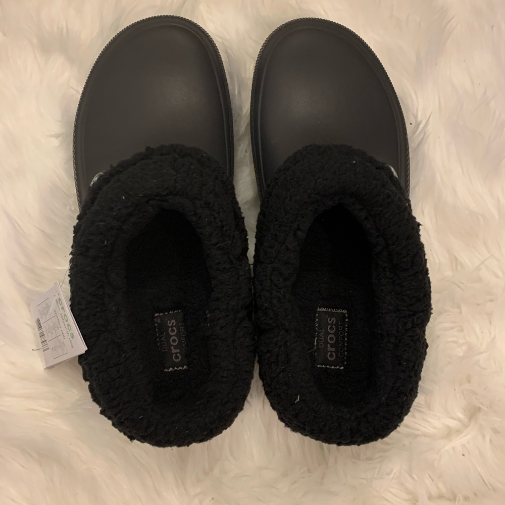 Black brand new crocs with tags M9/W11. Classic blitzed III clog . Never worn.
